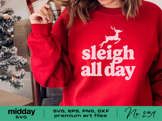 Red sweater with 'Sleigh All Day' text and reindeer design, ideal for Christmas crafts, shirts, and gifts, includes SVG and PNG files.