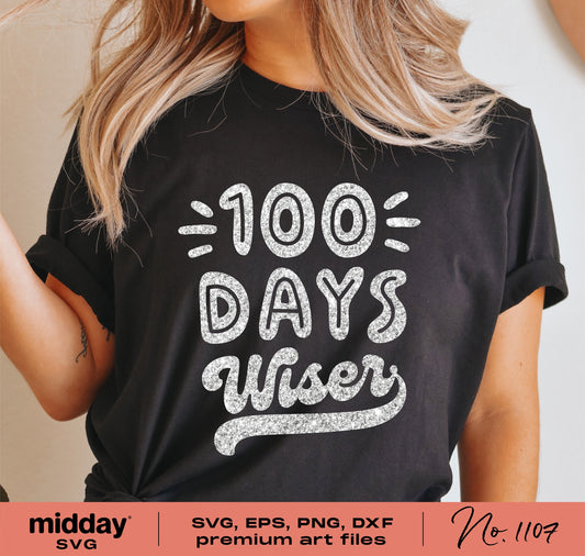 Woman wearing black shirt with '100 Days Wiser' graphic, suitable for 100th day of school SVG, PNG, DXF, EPS design projects.