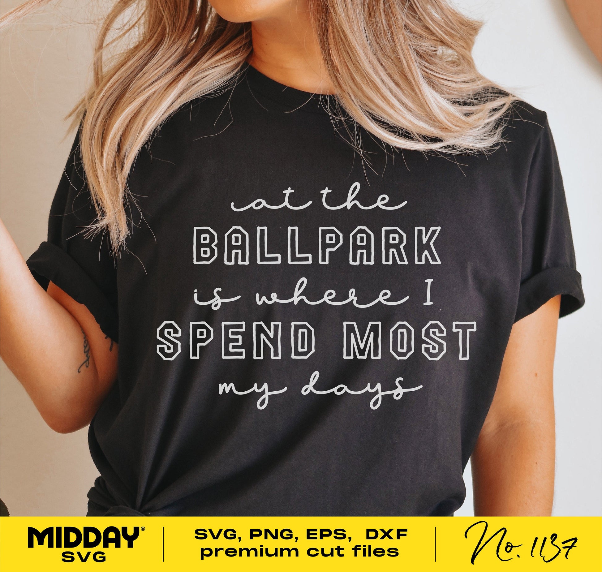 Woman wearing a 'At the Ballpark' shirt, ideal for baseball moms, available in SVG, PNG, EPS, DXF formats for Cricut and Silhouette.