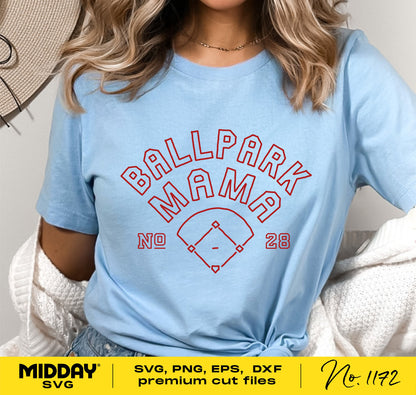 Woman wearing a light blue shirt with 'Ballpark Mama' design, showcasing a baseball graphic and player number, perfect for Cricut projects.