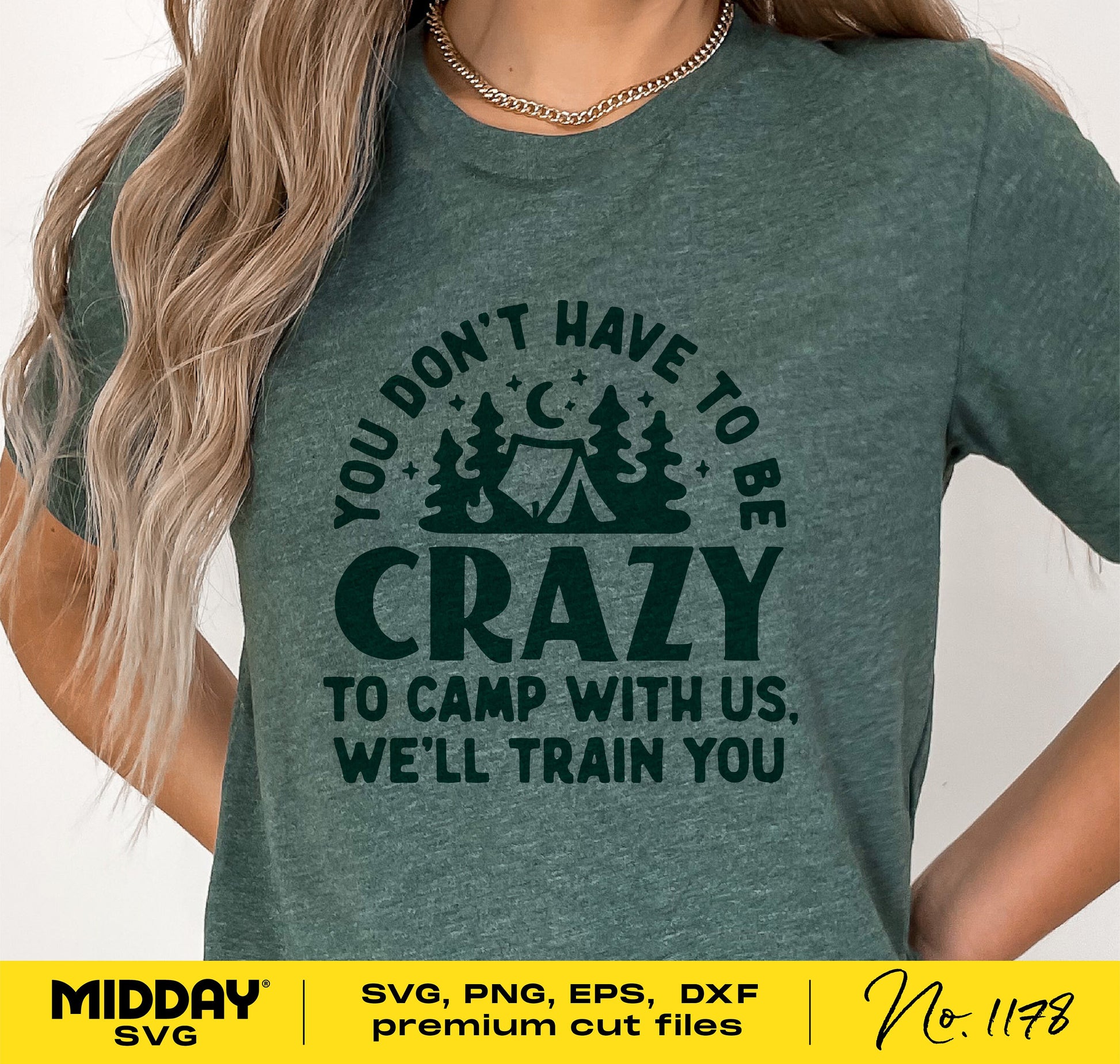 Person wearing a green t-shirt with 'You don't have to be crazy to camp with us, we'll train you' design, suitable for camping enthusiasts.