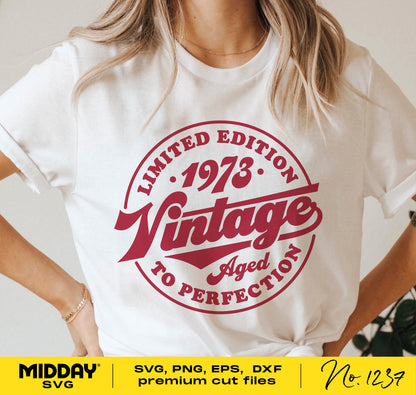 White t-shirt with "Vintage 1973" design, perfect for 50th birthday, includes SVG, PNG, EPS, DXF cut files for Cricut and Silhouette.