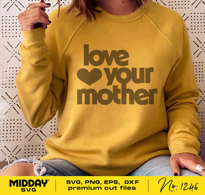 Person wearing yellow sweatshirt with 'Love Your Mother' design, suitable for Cricut and Glowforge; SVG, PNG, EPS, DXF included.