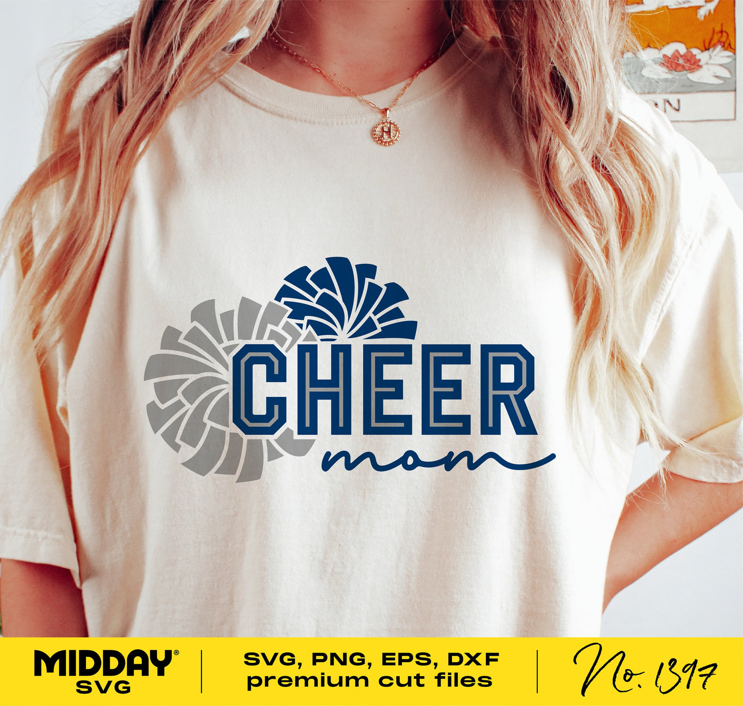 "Cheer Mom SVG design on white t-shirt with pom poms, perfect for Cricut and Silhouette projects"