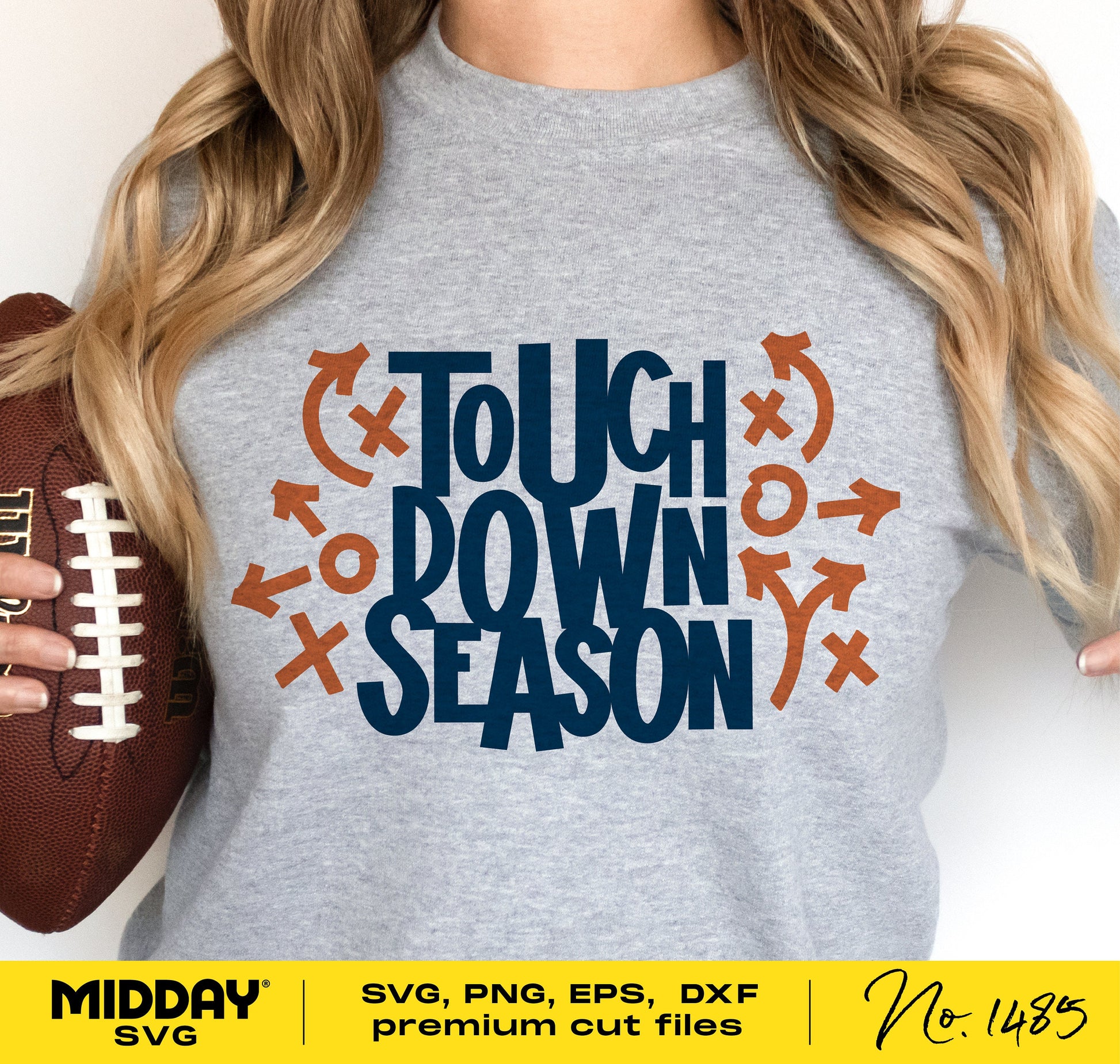 Woman wearing a grey t-shirt with 'Touchdown Season' SVG design, holding a football. Perfect for football moms and dads, Cricut projects.
