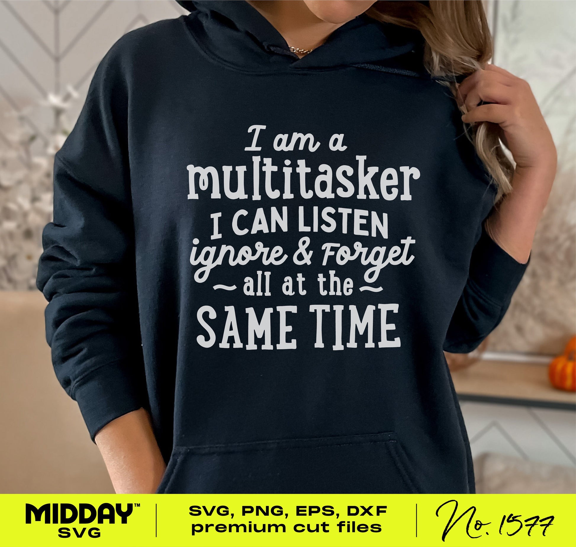 Black hoodie with humorous multitasking quote, highlighting wit and playfulness in SVG designs.