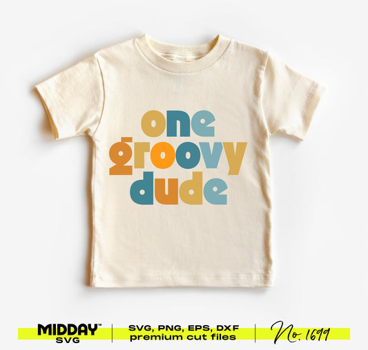 Cute 'One Groovy Dude' baby t-shirt with funky, colorful text design for toddlers, available as SVG/PNG for custom decor or apparel.