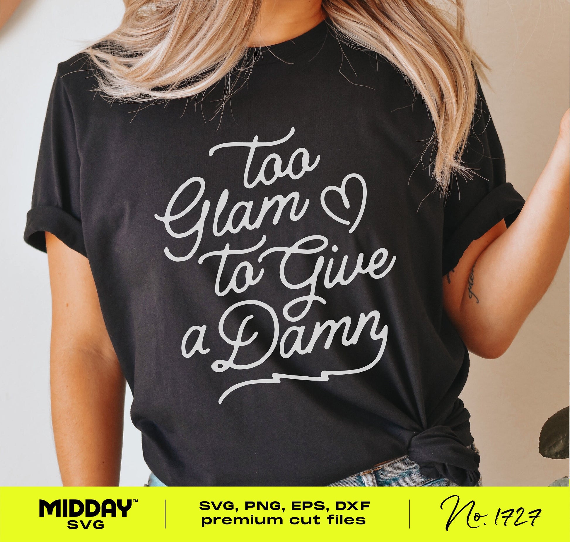 Woman wearing black t-shirt with white 'Too Glam to Give a Damn' print, showcasing sassy SVG design for crafting.