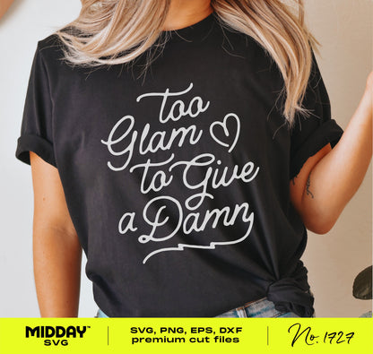Woman wearing black t-shirt with white 'Too Glam to Give a Damn' print, showcasing sassy SVG design for crafting.