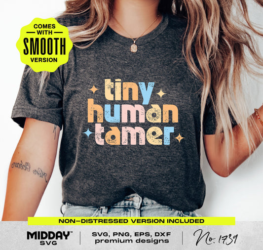 Woman wearing a t-shirt with 'Tiny Human Tamer' design, perfect for preschool and kindergarten teachers.